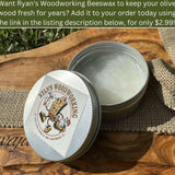 Open tin of beeswax wood polish on an olive wood board, a care add-on for olive wood bowls