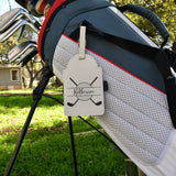 White leather golf tee holder engraved with a sample name and crossed golf clubs