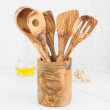 Olive wood utensil set with holder, five handmade cooking utensils standing in an olive wood crock
